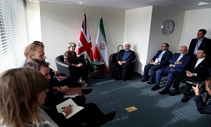 Rouhani, May call for closer coop. on bilateral, regional issues