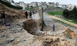 Palestinians Rejoice as Mother Nature Brings Down Israeli Apartheid Wall