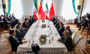 Rouhani, Xi rap US unilateralism on SCO sidelines