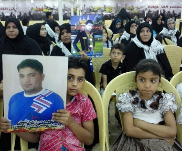 همایش تجلیل از خانواده شهدای حشد الشعبی در حله عراق برگزار شد+ تصاویر