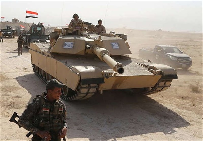 حملات توپخانه‌ای نیروهای عراقی به مواضع داعش در مرز با سوریه