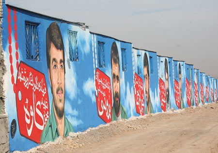 گزارشی از بزرگترین نقاشی دیواری چهره سرداران شهید در کشور
