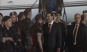 Hariri returns home weeks after resignation