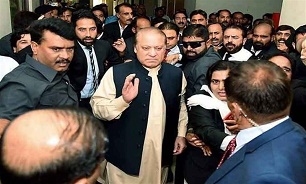 Ex-PM Sharif Returns to Pakistan for Court Hearing