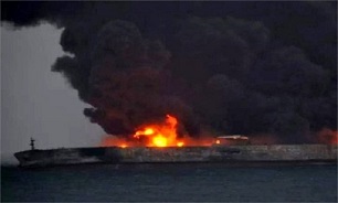 Still hope crew members found alive in engine room of burning Iranian tanker
