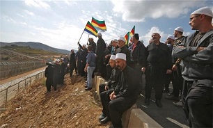Syrians in Occupied Golan Burn Israeli Election Cards in Defiance of Judaization Practices
