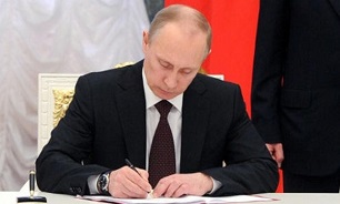 Putin Voices ‘Serious Concern’ over Martial Law in Ukraine
