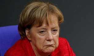 Merkel Under Fire from Own Ranks Over German Coalition Deal