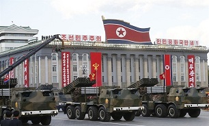 North Korea Stages Show of Force with New Missiles during Parade