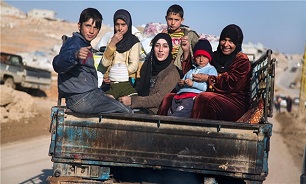 First Group of Civilians Leave Eastern Ghouta after Agreement with Russian Officials