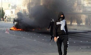 Bahraini Forces Arrest over Two Dozen Activists