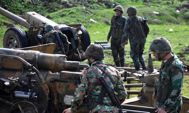 Militants agree to return area near Homs to government
