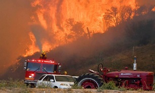 Two Fires Are Burning in California, A Massive Power Shutoff Leaves Nearly A Million in The Dark