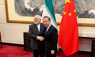 FM Zarif meets with Chinese counterpart upon arrival in Beijing
