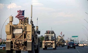 Trucks carry US military equipment from Syria to Iraq