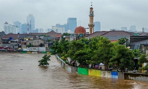 Thousands Caught in Floods in Indonesia’s Sinking Capital