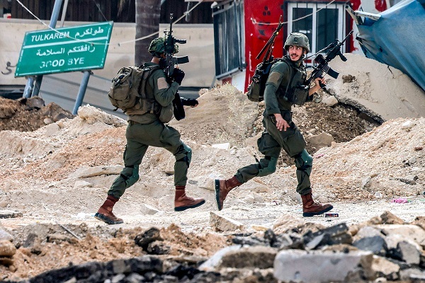 Intense conflict between Palestinian fighters and Zionist soldiers in the West Bank