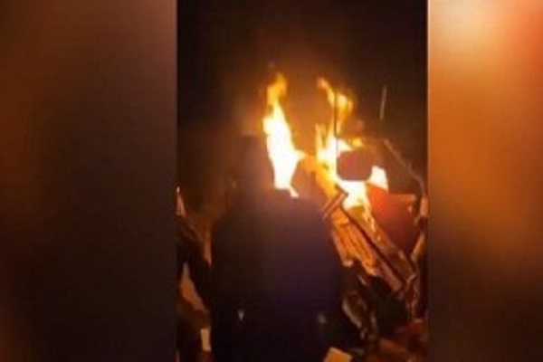 Syrians Set Fire to Packages Provided by the Zionist Military