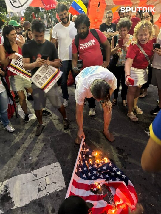 Brazilian Protesters Burn US Flag