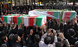 خاکسپاری دو شهید گمنام در منطقه صد دستگاه اهواز