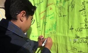 همبستگی کودکان همدانی با شهید ۴ ساله اهواز