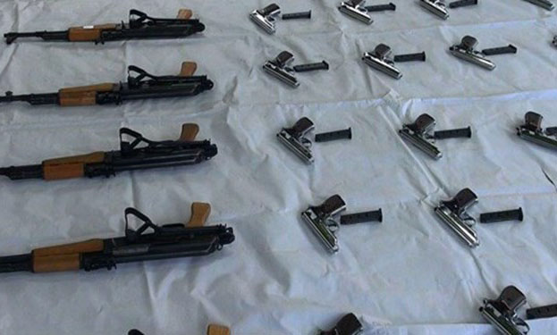 کشف ۵۵ قبضه اسلحه جنگی در کرمانشاه