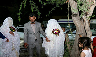 ازدواج زوج جوان خوزستانی در اردوگاه سیل زدگان شهید هاشمی اهواز