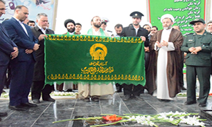 ادای احترام خادمان آستان قدس رضوی به نخستین شهید دانش آموز دفاع مقدس