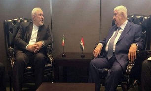 گفت‌و‌گوی ظریف با ولید معلم و تأکید بر ادامه روابط ایران و سوریه