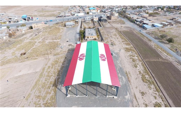 طراحی بزرگترین پرچم جمهوری اسلامی ایران در نیشابور+ عکس