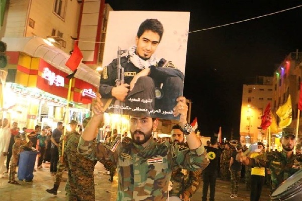 مجاهدت خبرنگار جنگی جبهه مقاومت عراق +عکس