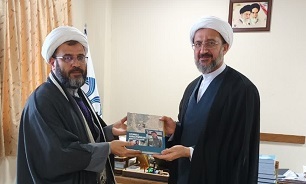 اعطای حکم ریاست هیات امنای یادمان شهید گمنام دانشگاه قم