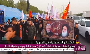 راهپیمایی اربعین در عراق مزین به تصاویر شهید سلیمانی