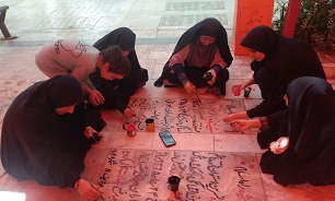 رنگ آمیزی قبور مطهر زنان شهید قم توسط دانش آموزان هنرستانی