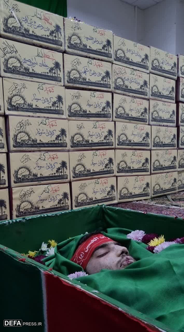 پیکر شهید مدافع امنیت در کنار شهدای گمنام دفاع مقدس+ عکس