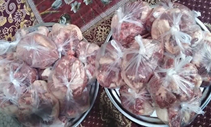 توزیع گوشت نذری بین خانواده کم برخوردار شهرستان ساوجبلاغ