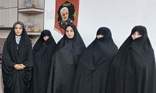 تجلیل خانواده سردار شهید زین الدین از بانوی قهرمان کشتی آلیش آسیا در قم