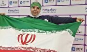 عکس/ اهدای مدال طلا بانوی ورزشکار کشورمان به مردم غزه