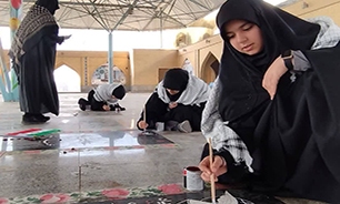 رنگ آمیزی قبور شهدا توسط دانش آموزان خرمشهر