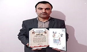 تجلیل از مدیر دفتر خبرگزاری دفاع مقدس خوزستان در جشنواره رسانه‌ای سرزمین مقدس