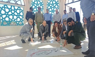 ادای احترام به شهدای بخش احمدی سرآغاز میزخدمت به مردم 