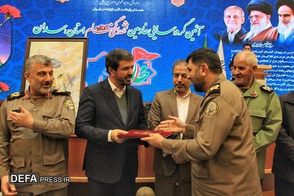 اهدای حکم انتصاب استاندار همدان به سمت رئیس شورای هماهنگی حفظ آثار دفاع مقدس استان +تصاویر