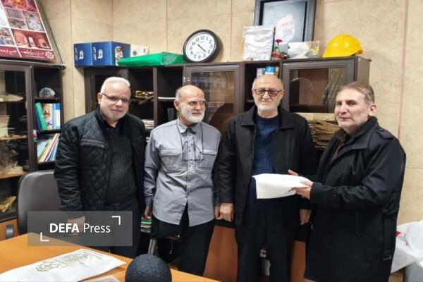 تجلیل مدیرکل حفظ آثار دفاع مقدس قزوین از پیشکسوتان همراه در برگزاری شب وداع شهدای گمنام