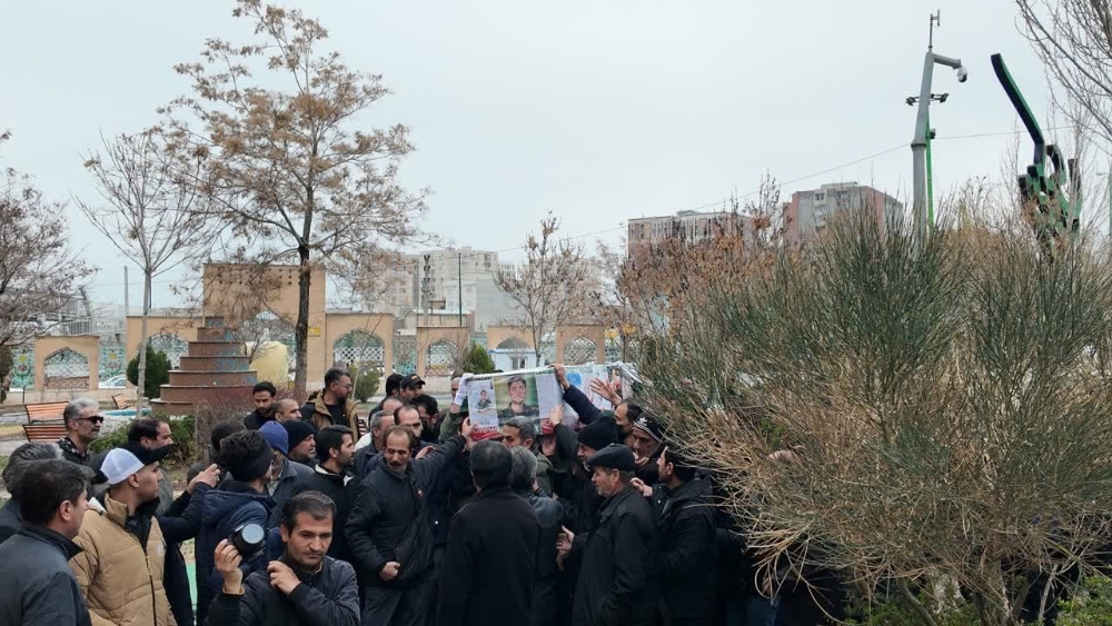 تصاویر/ پیکر مطهر شهید وحید هاشمی در گلزار شهدای اراک آرام گرفت