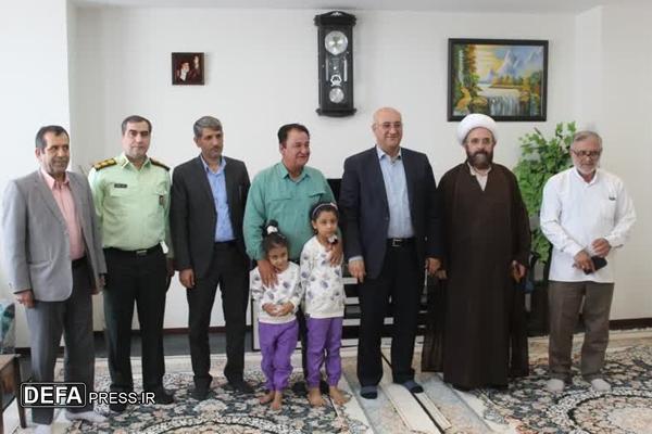 تجلیل از دو جانباز سرافراز دفاع مقدس در اشتهارد با حضور مسئولان شهرستان