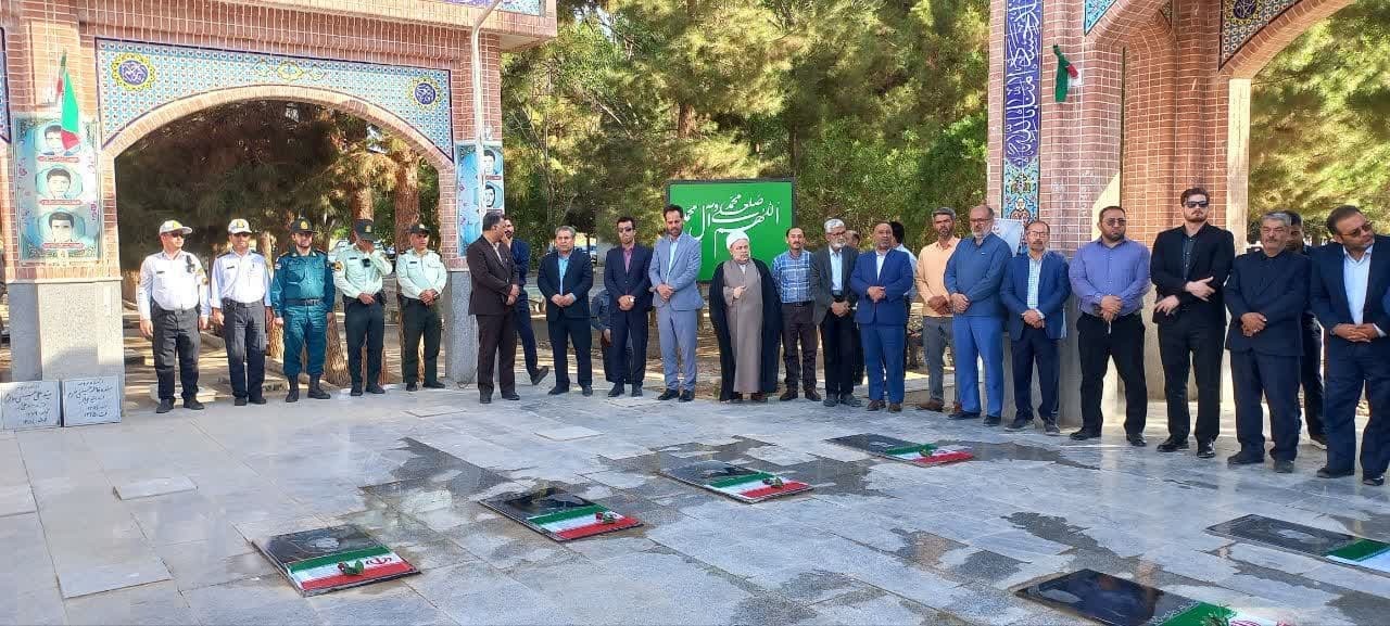 تصاویر/ادای احترام مسؤلین قضایی خراسان شمالی به مقام شامخ شهدا