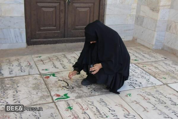 برگزاری پویش رنگ‌آمیزی سنگ مزار شهدا در آرامگاه خواجه ربیع مشهد+ تصاویر
