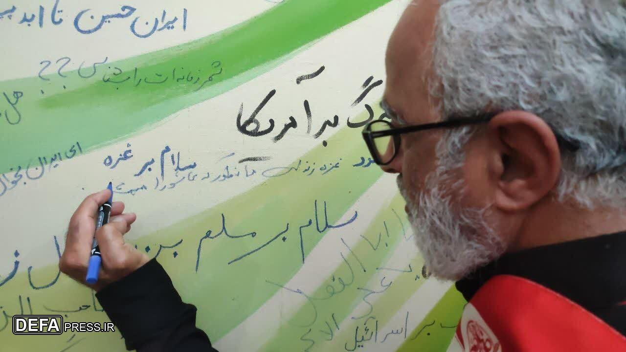 همراهی زائران پیاده‌روی اربعین در تکمیل اثر هنری «عصرعاشورای امروز»