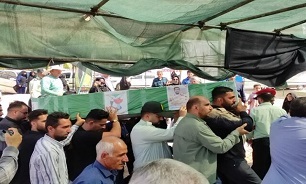 آیین تشییع پیکر مطهر مرزبان شهید «علی بداق» در خرم‌آباد+ عکس