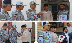 همراهی مرزبانان با فرزند شهید به مناسبت آغاز سال تحصیلی